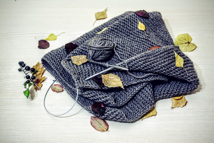 Knitting with autumn leaves